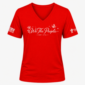 Red We the People V-neck shirt with white script lettering, flower detail, butterfly, and EST 1776.