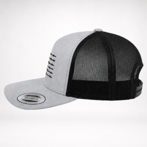 side profile of barbed wire american flag trucker hat with heather gray front, black mesh back, and curved bill