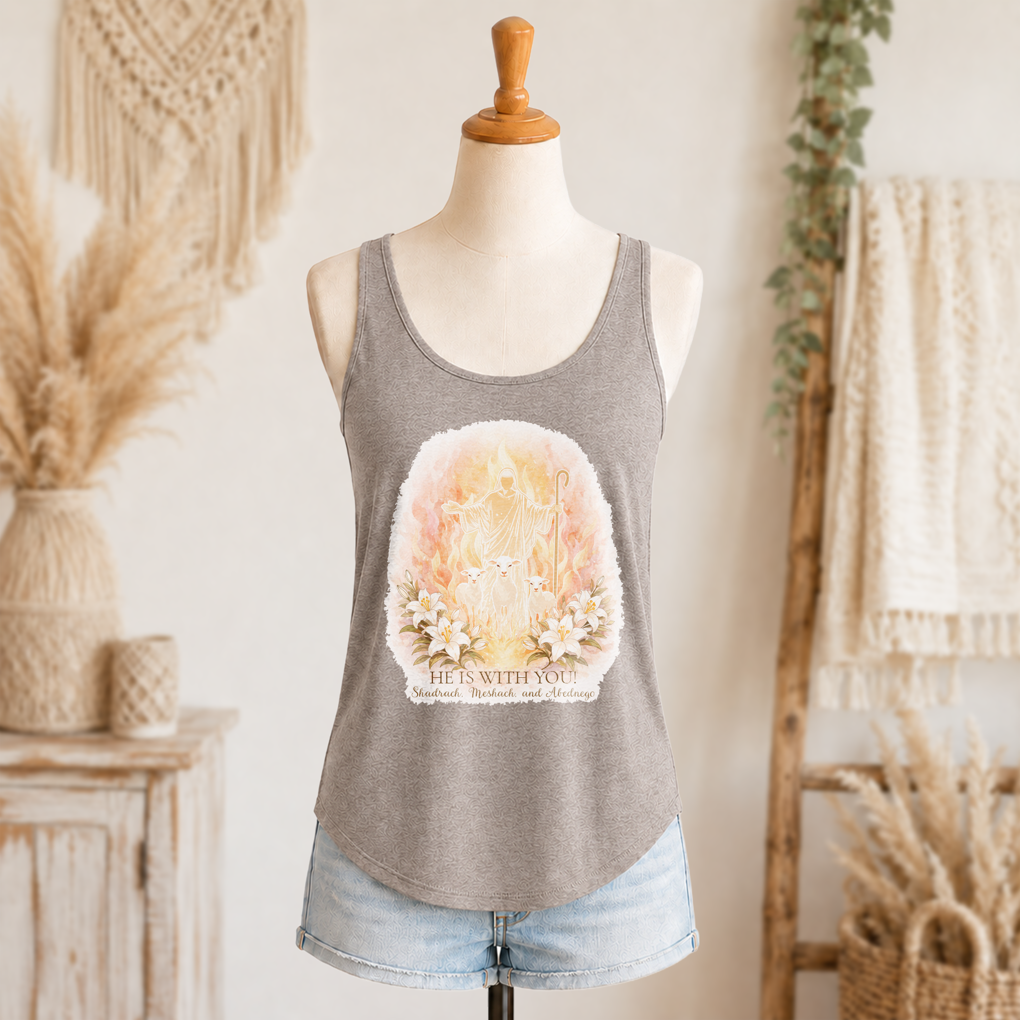 He is with You women’s Christian festival tank in ash with Jesus, lambs, lilies, and flame artwork