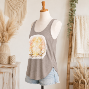 He is with You women’s festival tank side view in ash with front Christian artwork and denim shorts