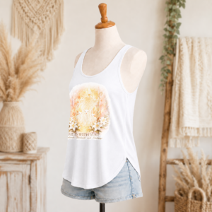 He is with You women’s festival tank side view in white with front Christian artwork and denim shorts