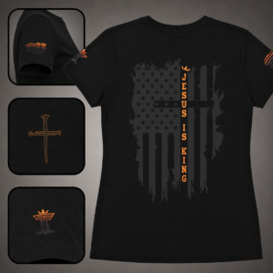 Black women’s Jesus Is King shirt with orange accent, distressed patriotic cross flag back design, sleeve flag, nail cross, and brand logo details.